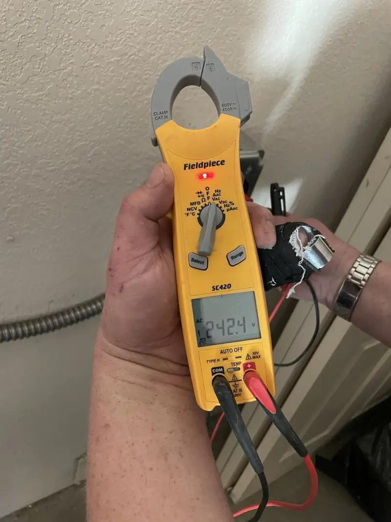 Voltage testing with clamp meter during Circuit Breaker Repair in River Rouge